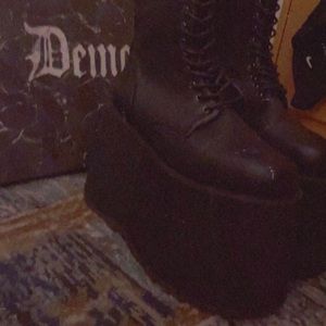 Demonia knee high platform boots in black pu